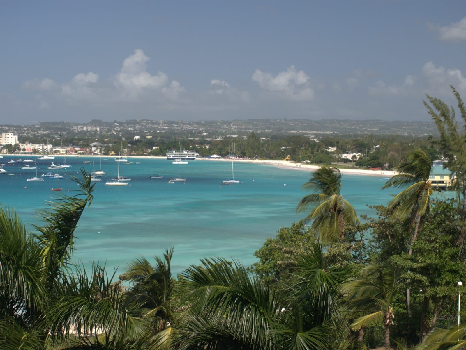 Carlisle Bay, Barbados, with yachts moored in the turquoise water and Bridgetown beyond