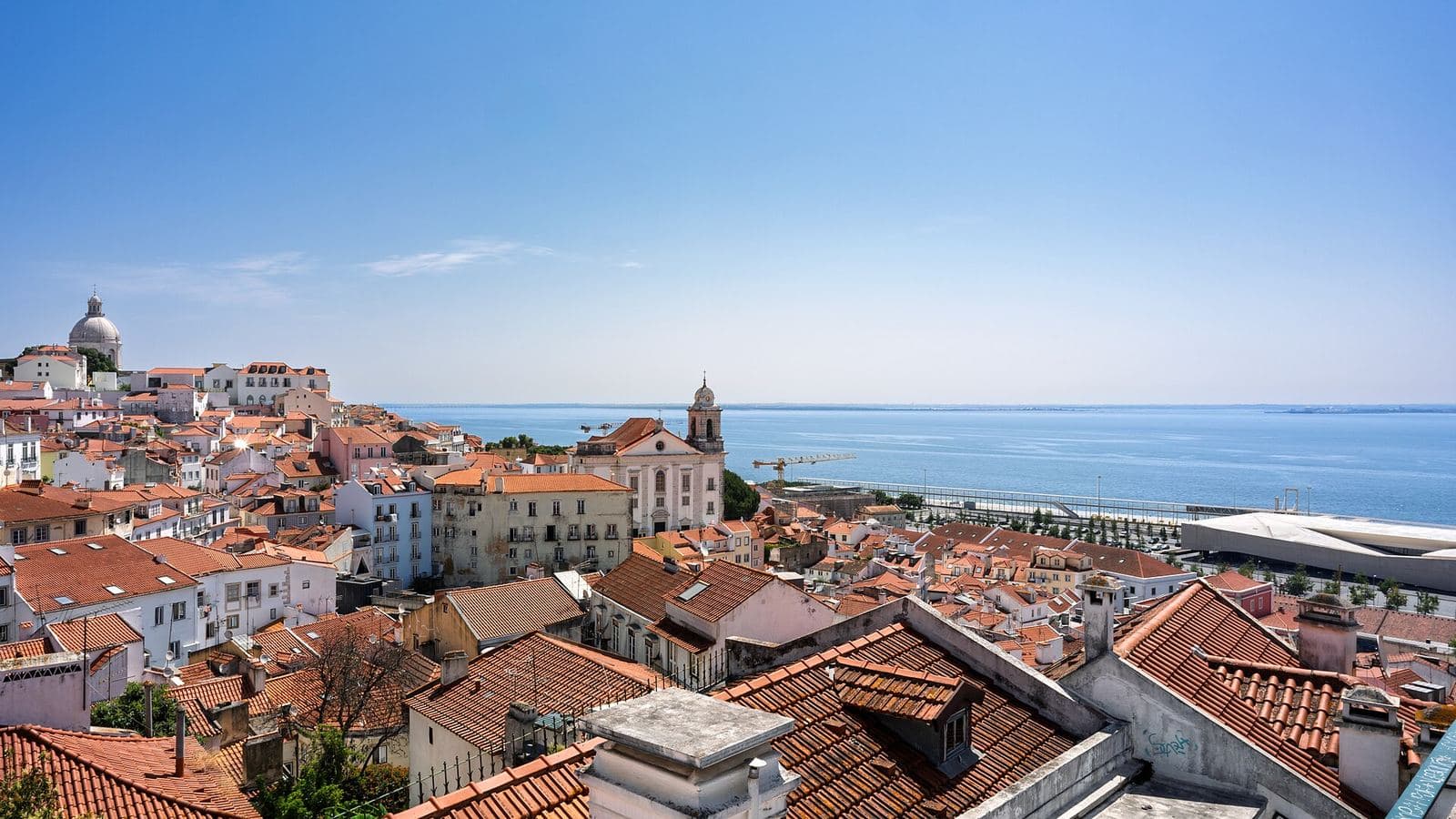Rooftop view over the Alfama district toward the Tagus, Lisbon